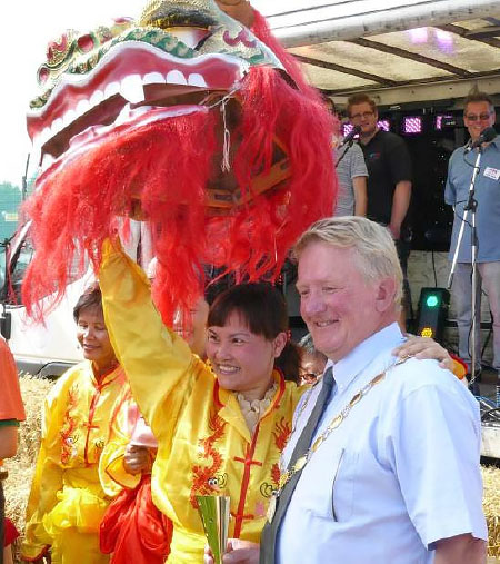 Bradley Stoke Mayor Cllr John Ashe presents the Chinese Association with their award on Saturday 23rd August 2014